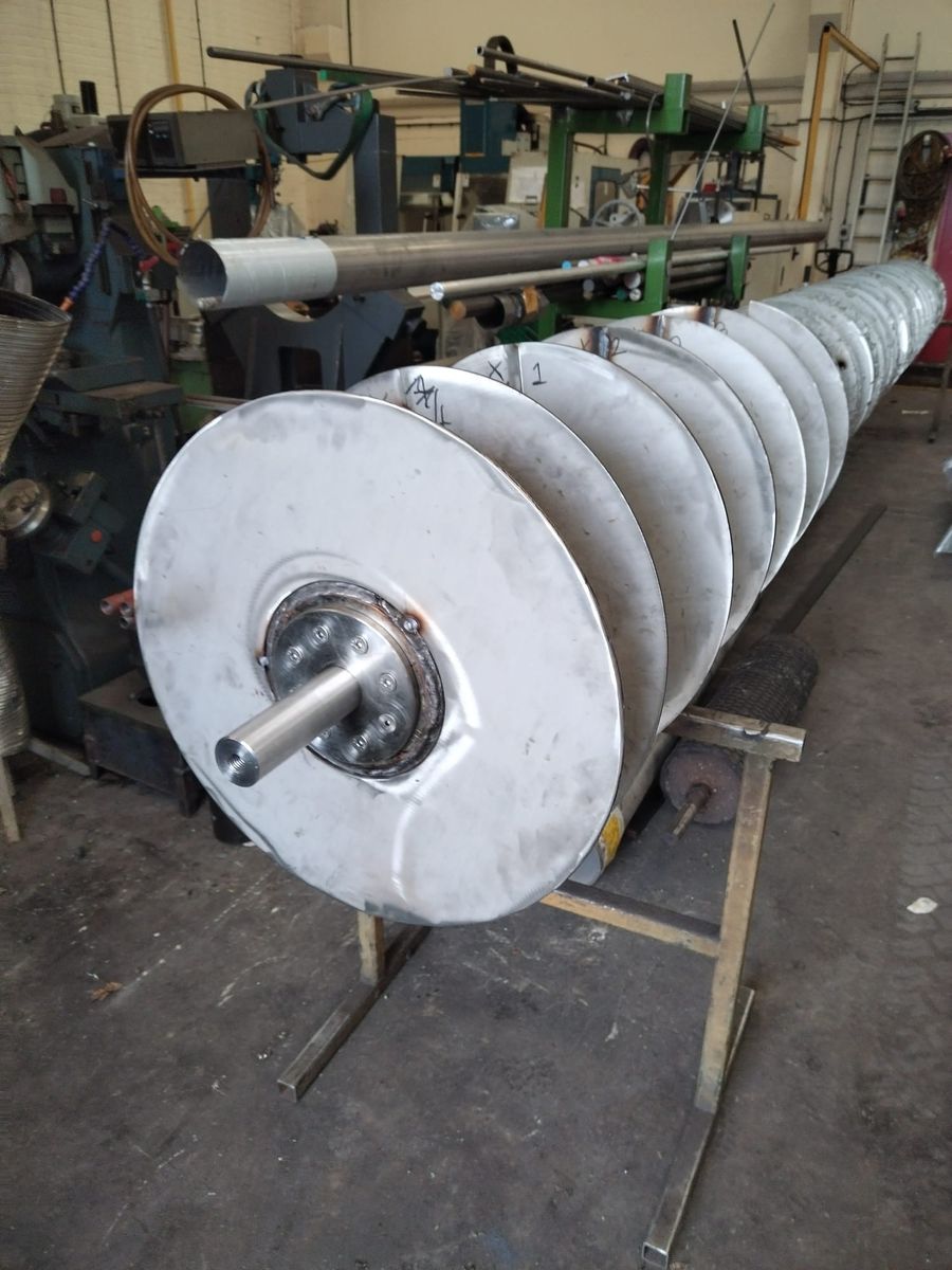 Stainless steel waste removal screw conveyor fabricated by CDK Services Wakefield